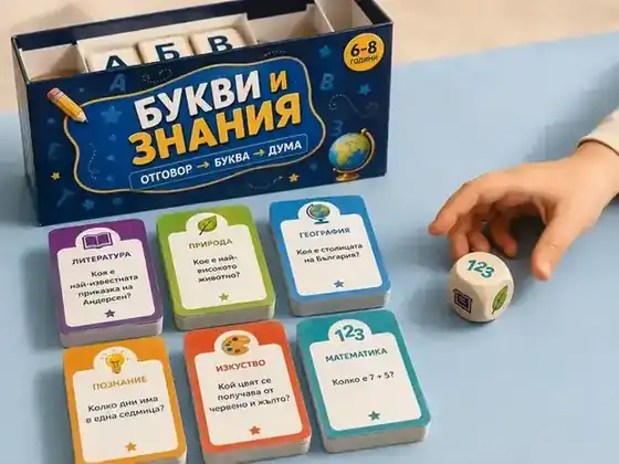 Дете хвърля зар до шестте цветни категории на играта